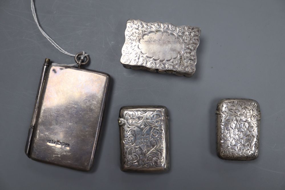 Two early 20th century silver vesta case, a silver snuff box and a silver aide memoire.